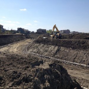 Pretrenching and dewatering for sewer installation