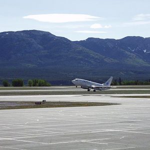 Erik Nielsen Whitehorse International Airport, with jet taking off